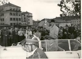 President of Indonesia, Sukarno was waving at the Yugoslavians when stepping in the presidential car