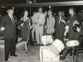 President of Indonesia, Sukarno (left) and the Indonesian delegates were enjoying the music enter...